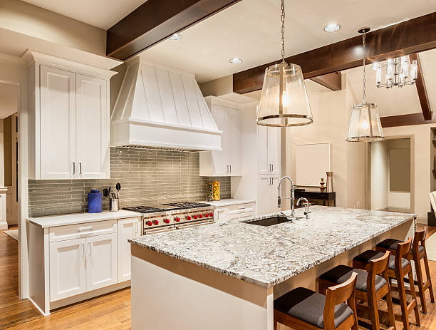 istock Beautiful Kitchen in New Luxury Home with Island, Sink, Cabinets 481874028