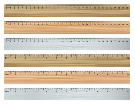 Set of Rulers In Inches and Centimetres. Light and dark wood as well as a metallic version of each.