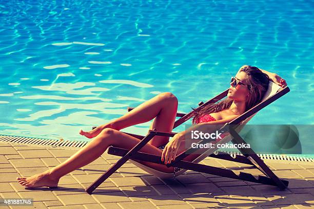 Sunbath Stock Photo - Download Image Now - Sunbathing, Adult, Beach