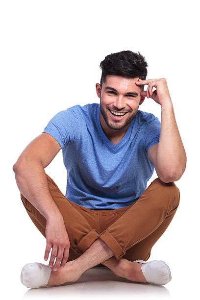 istock young pensive casual man sitting relaxed 481883035