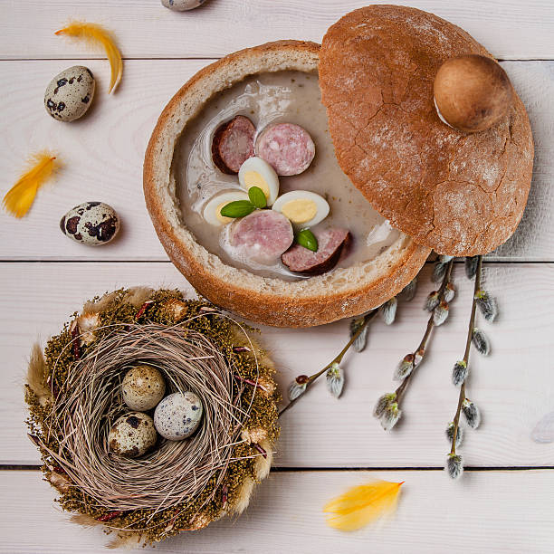 istock White borscht and nest with eggs on wood 481883285