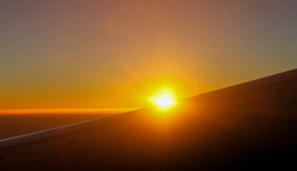 istock Sunrise from window at aeroplane 481885107