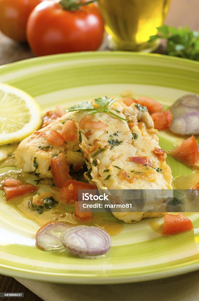 Cod with vegetable sauce fidh of cod fillet stuffed with vegetable sauce Chef Stock Photo