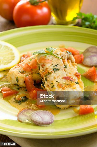 Cod With Vegetable Sauce Stock Photo - Download Image Now - Chef, Cod, Cooked