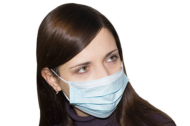 istock young woman wearing protective mask 481892285