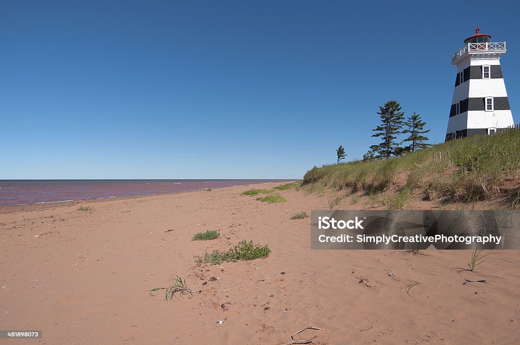 West Point Lighthouse przez Trawa Dunes, Wyspa Księcia Edwarda - Zbiór zdjęć royalty-free (Architektura)