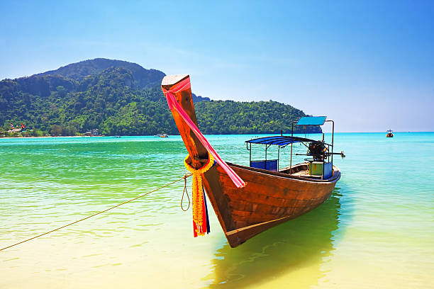 istock Traditional wooden boat at Phi-Phi island, Thailand 481903697