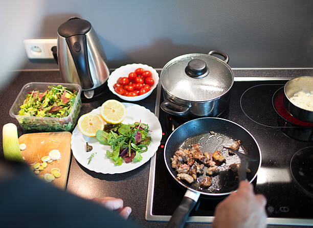 istock Cooking tasty family dinner at home 481904366