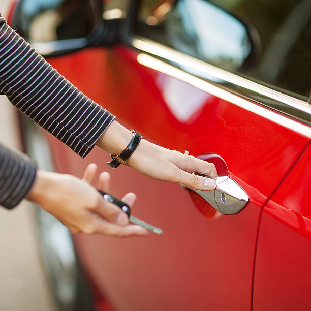 istock Beautiful young girl with car key 481905909