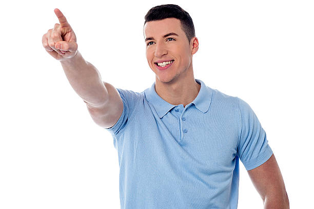istock Casual young man pointing away 481905969