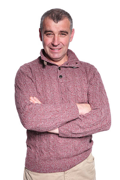 istock happy casual old man standing with hands crossed 481906529
