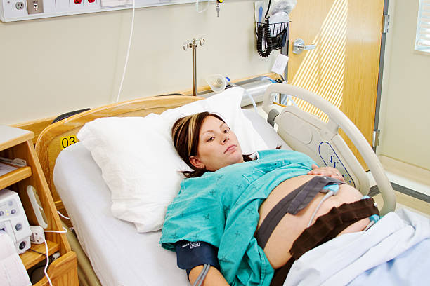 istock Maternity patient with fetal monitor attached 481909563