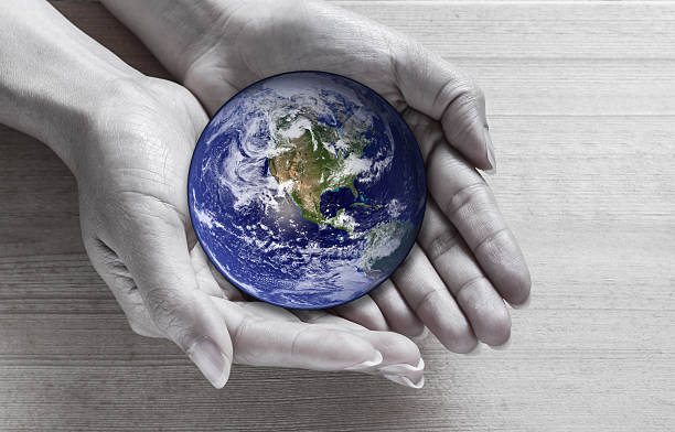 istock global in hands , Elements of this image furnished by NASA 481911338