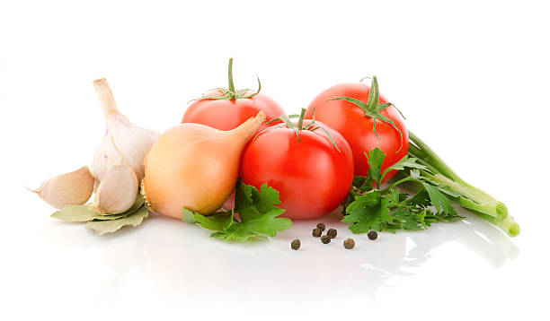 Fresh Vegetables and Spices on white background
