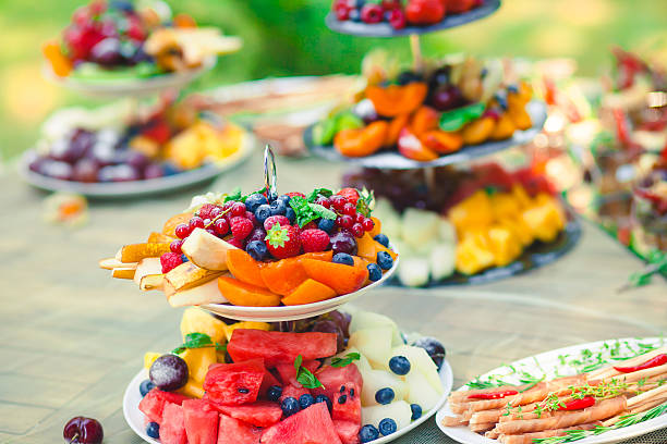 istock Beautifully decorated catering banquet table with different food snacks appetizers 481913806