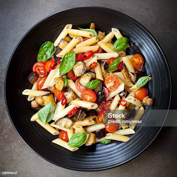 Eggplant Chilli And Tomato Pasta Stock Photo - Download Image Now - Pasta, Penne, Eggplant