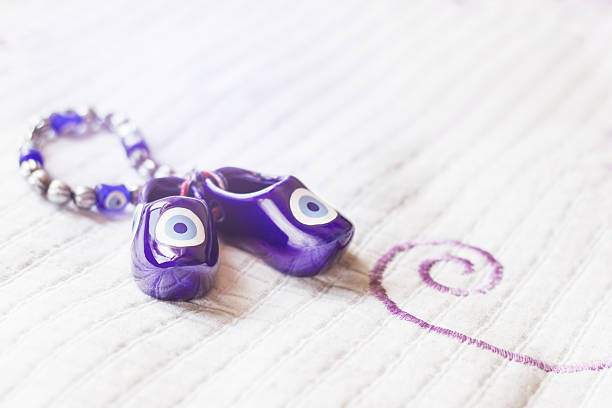 Evil eye bead accessories for shoes  a small baby stock photo
