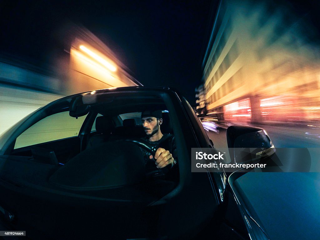 Crazy ride on the night by car Drive - Ball Sports Stock Photo