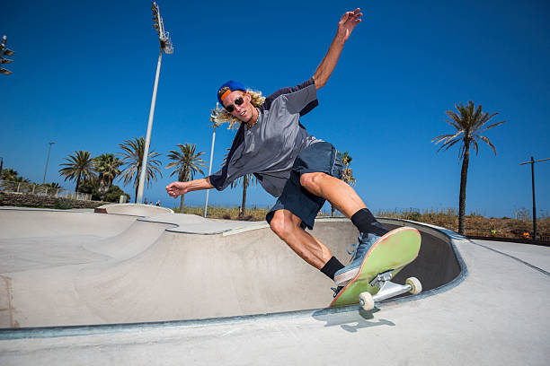 istock Skateboarder jumping in skatepark 481924978
