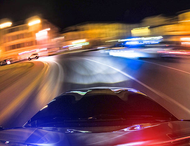 istock police chasing on the city 481924998