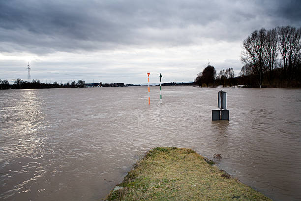 istock High water at River Rhine, upcoming rain, clouds 481925090