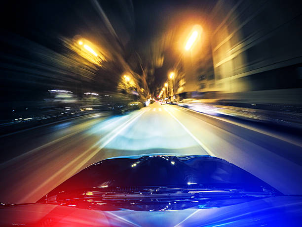 警察に恵まれ、街 - car pursuit chasing night ストックフォトと画像