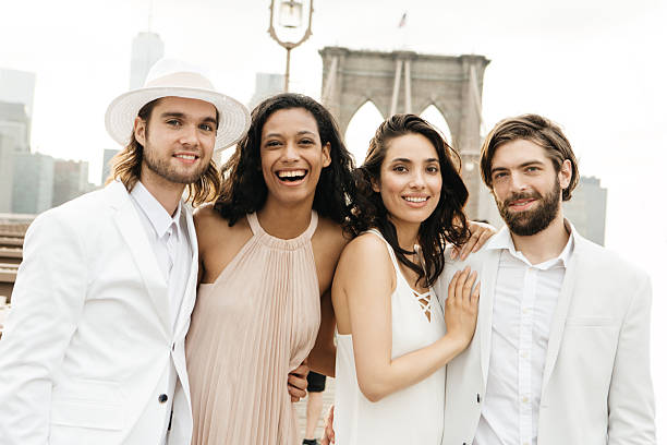 istock Group of friends on Brooklyn Bridge 481925436