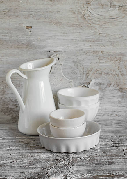 istock white vintage crockery - enamelled jug, ceramic bowl 481926098