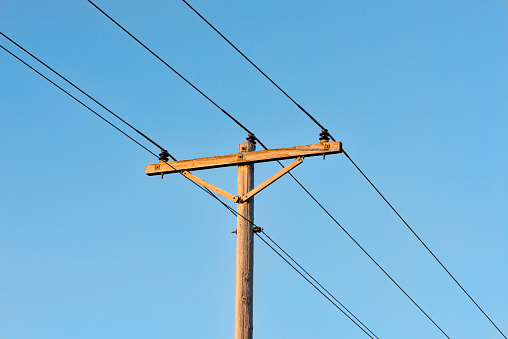 Telephone pole & wires found in rural county. This shot was taken with a high quality 105 mm lens. 