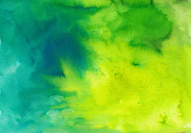 An hand painted background, painted with watercolors and inks. The prominent colors in this painting are yellow, blue and green. There is a texture of brush strokes and pooling of paint.