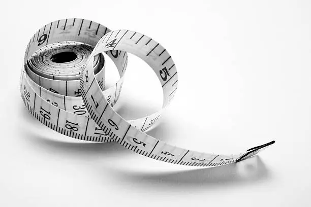 Sewing tailor measuring tape isolated on white