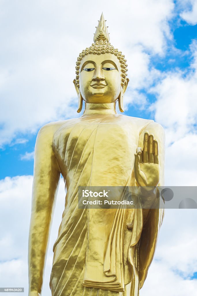 Huge golden of Buddha statue Huge golden of Buddha statue on sky,AYUTTHYA THAILAND 2015 Stock Photo
