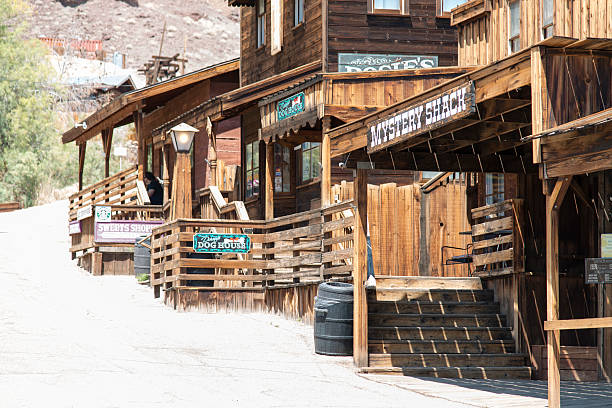 Calico, California, United States - May 21, 2015: View at the main street in the Calico ghost town in the desert of California very close to Nevada. Calico is an old west mining touristic village that has been around since 1881. Image taken during daytime.