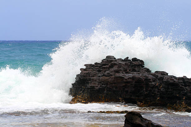 Sunrise on waves seen from Hookipa Beach on Maui, Hawaii
