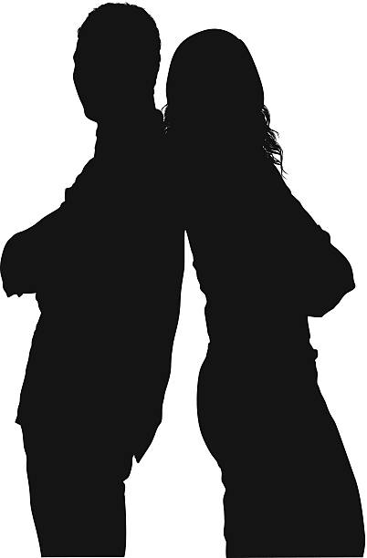 Silhouette of a couple standing together Silhouette of a couple standing togetherhttp://www.twodozendesign.info/i/1.png back to back silhouette stock illustrations