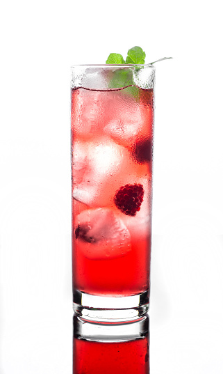 Red cocktail with raspberry isolated on white background