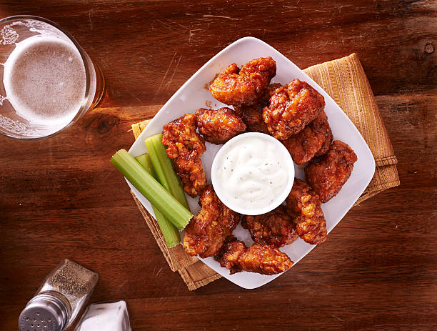 istock bbq buffalo chicken wings with beer 481946564
