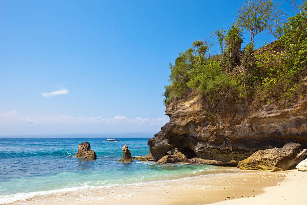 istock sandy beach on rocks at ocean. Indonesia, Bali 481946798