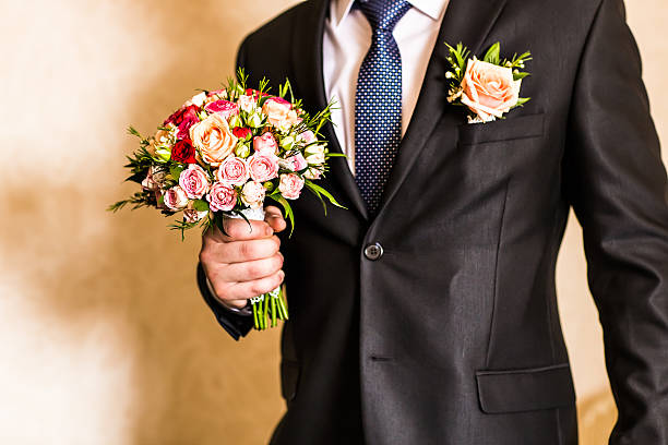 istock man in a suit with boutonniere 481949338