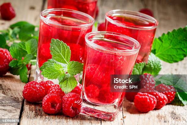 Red Refreshing Cocktail With Raspberry And Mint Stock Photo - Download Image Now - 2015, Alcohol - Drink, Alcohol Abuse