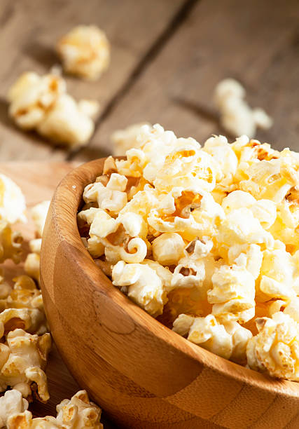 istock Sweet caramel popcorn in a wooden bowl 481949936