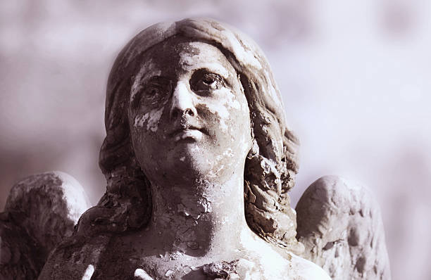 istock Vintage image of a sad angel on a cemetery 481951056