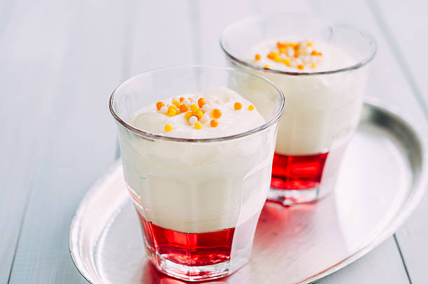 istock Lemon Dessert with Red Jelly in bistro glasses 481951276