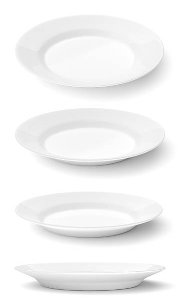 Empty ceramic round plates isolated on white