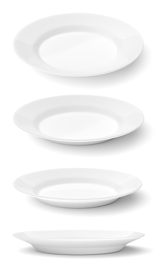 Set of empty ceramic round plates isolated on white background