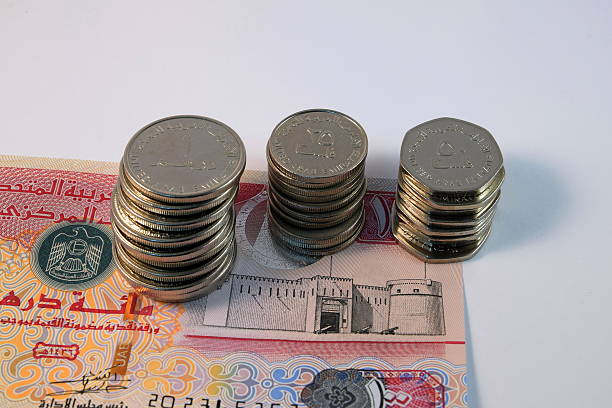 Close up of  Various currency notes and coins from United Arab EmiratesClose up of  Various currency notes and coins from United Arab Emirates