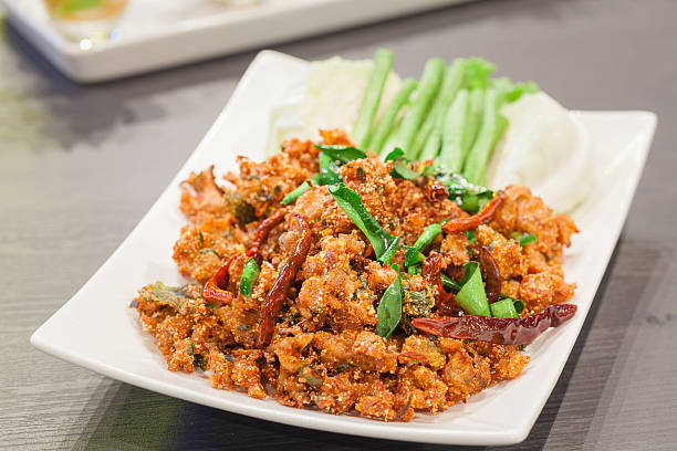 istock Thai cuisine spicy crispy pork salad, Larb 481957786