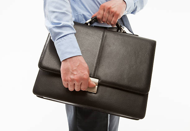 istock Unrecognizable businessman holding a briefcase 481959264