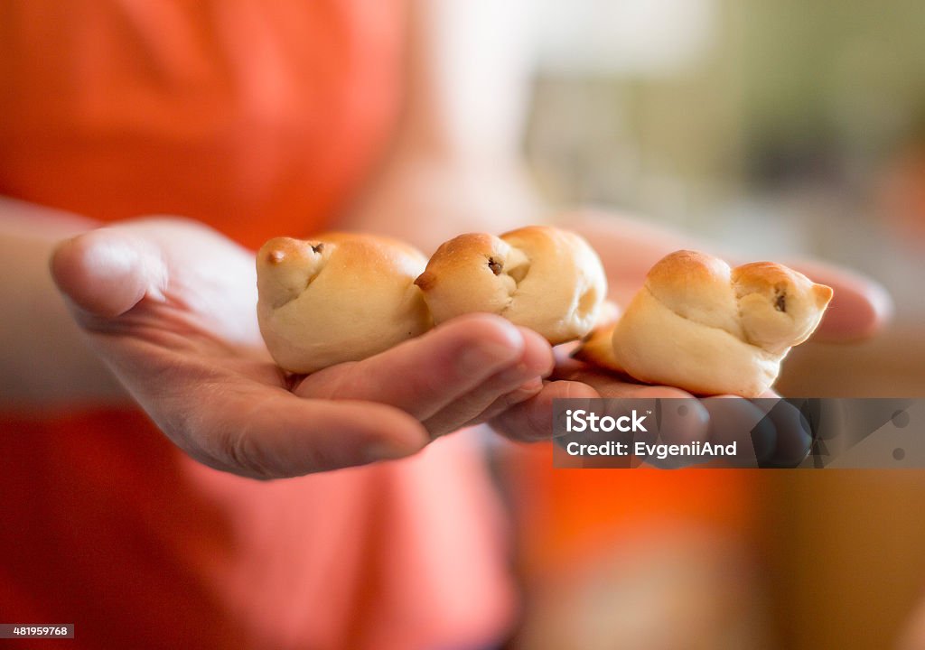 birds of dough the woman holding the palms traditional Easter buns in the form of larks 2015 Stock Photo
