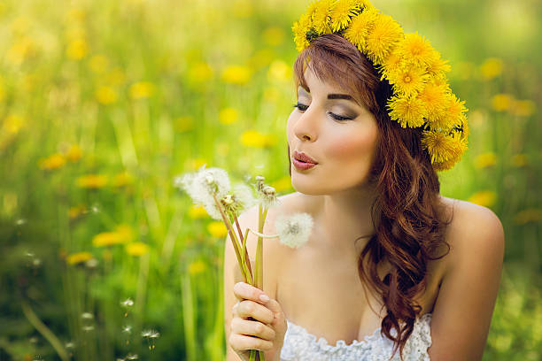 istock Girl with flowers 481959902
